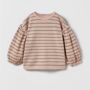 Pale pink striped balloon sleeve top
